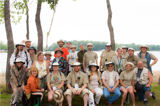 group of people dressed in tan clothing